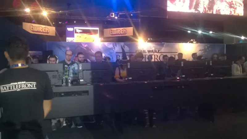 Rows of players at Star Wars Battlefront demo stations at a gaming expo