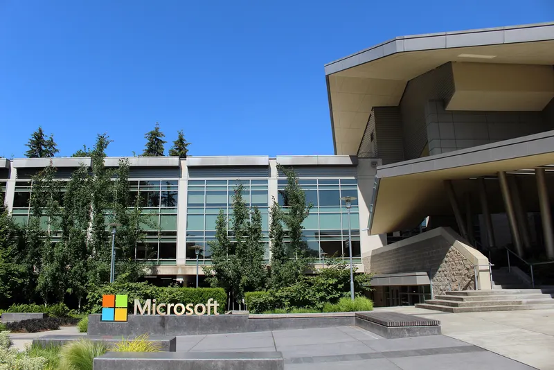 Microsoft logo sign in front of Building 92 on the Redmond campus
