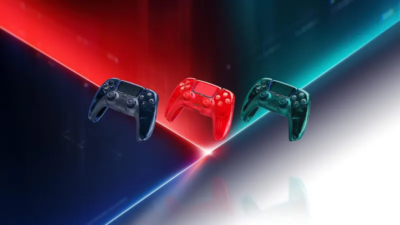 Three transparent DualSense controllers in grey, orange and green tones