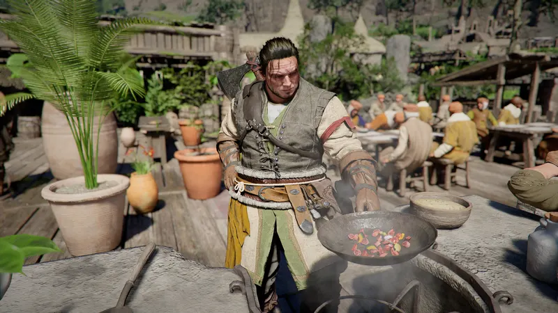 A cook tossing food in a pan at a busy outdoor restaurant