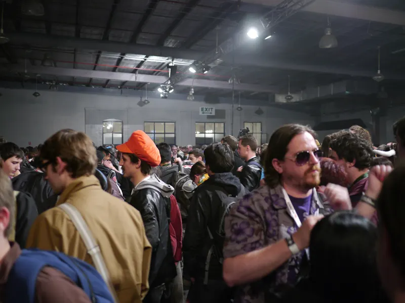 A crowd of attendees inside a hall at PAX Australia