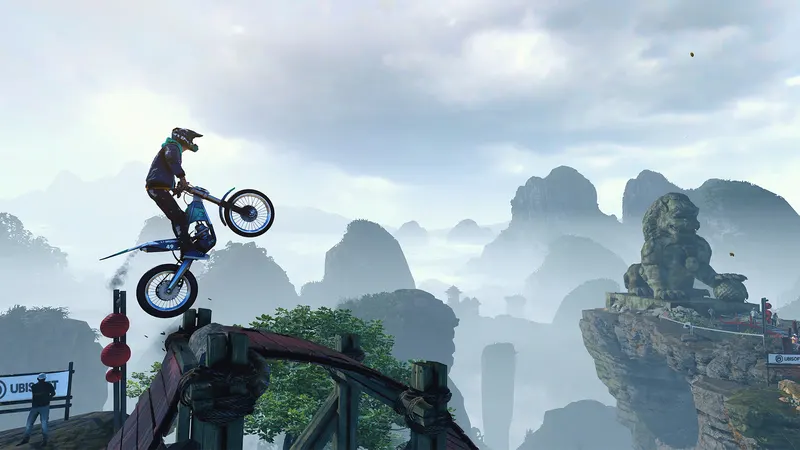 A trials motorbike rider balancing on a ramp in Trials Rising