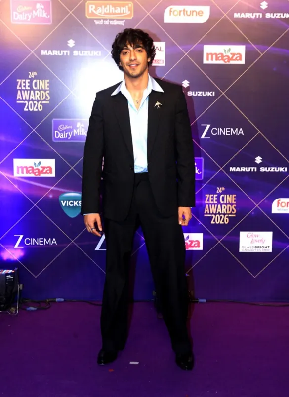 Ahaan Panday in a black suit at an awards event