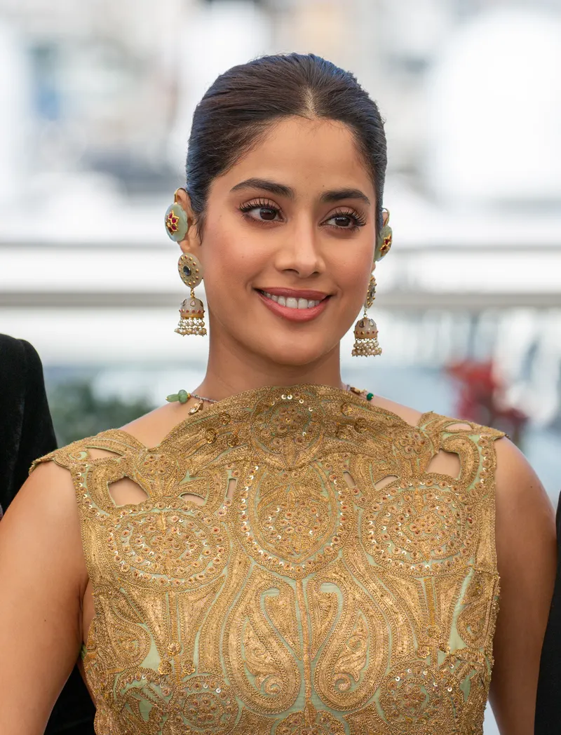 Janhvi Kapoor in a gold embroidered outfit at a photocall
