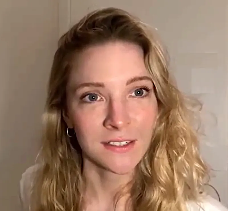 Morfydd Clark looking at the camera