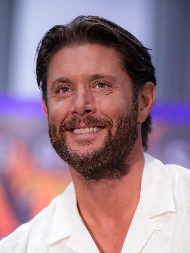 Jensen Ackles smiling at a fan convention