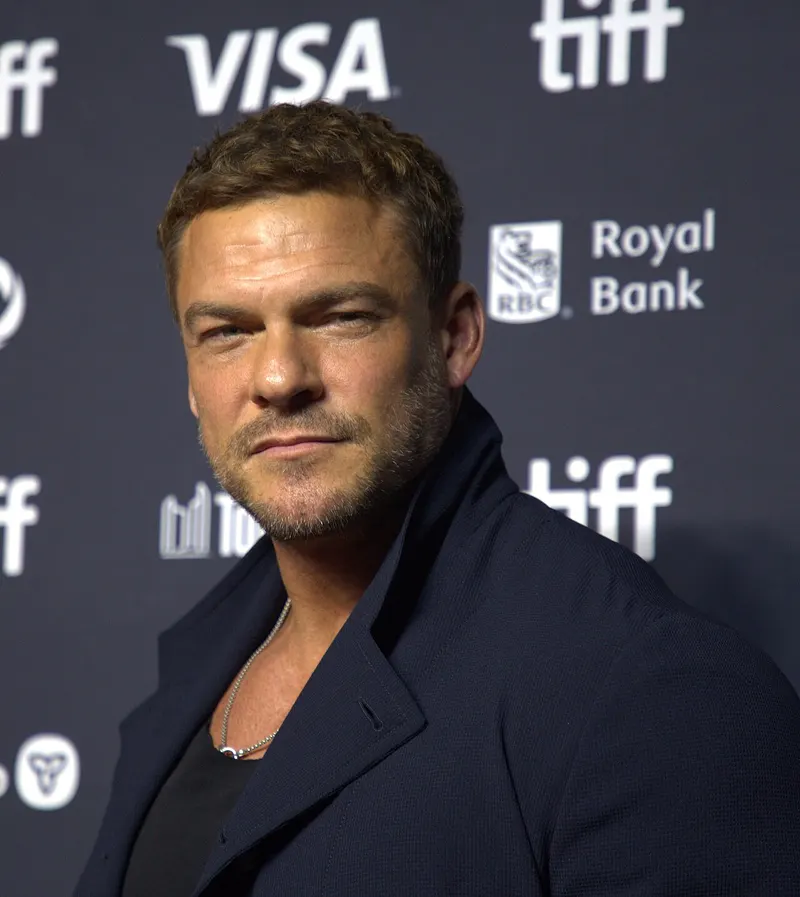 Alan Ritchson at a festival media wall