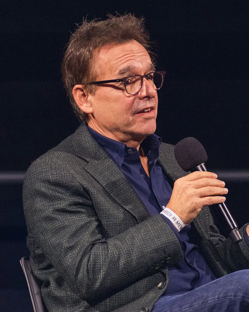 Chris Columbus speaking into a microphone