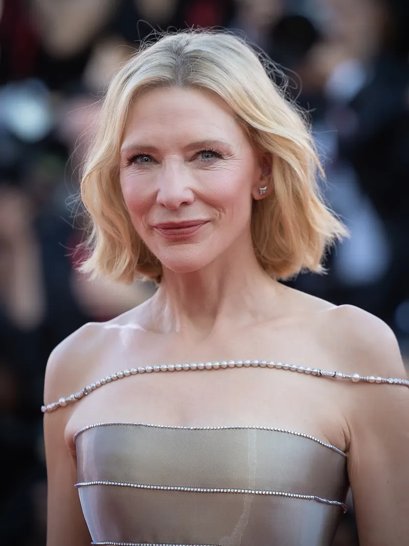 Cate Blanchett smiling on a red carpet
