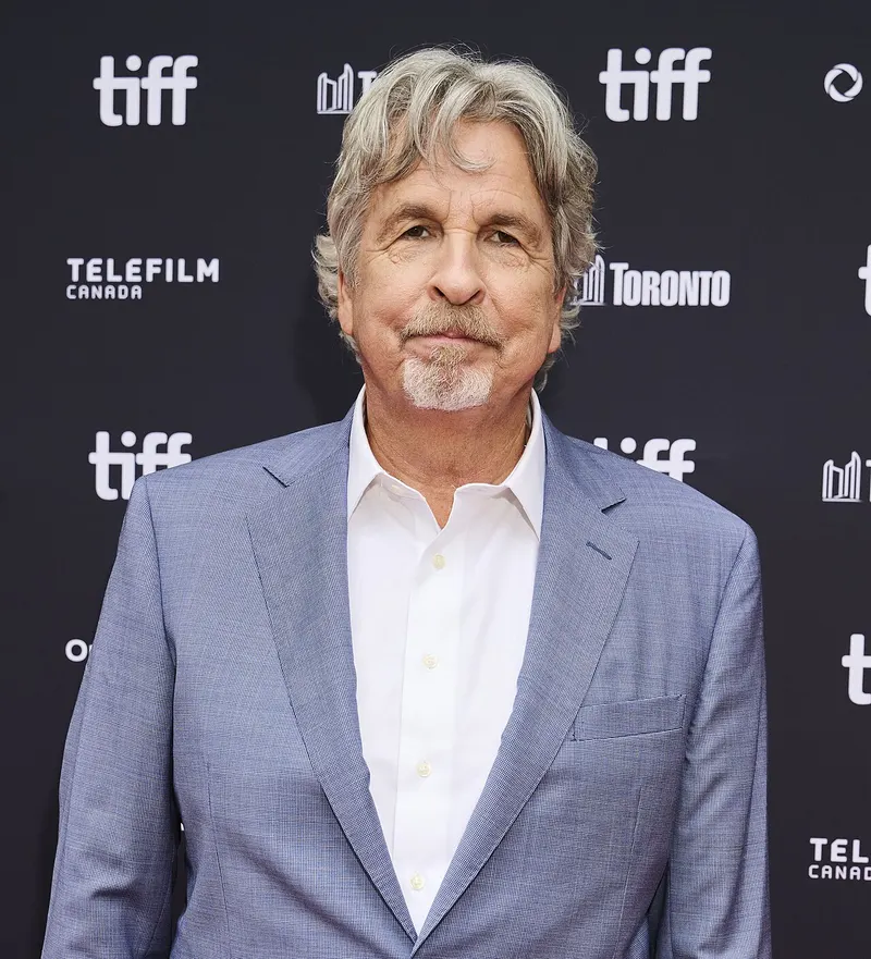 Peter Farrelly in a blue suit at a film festival premiere