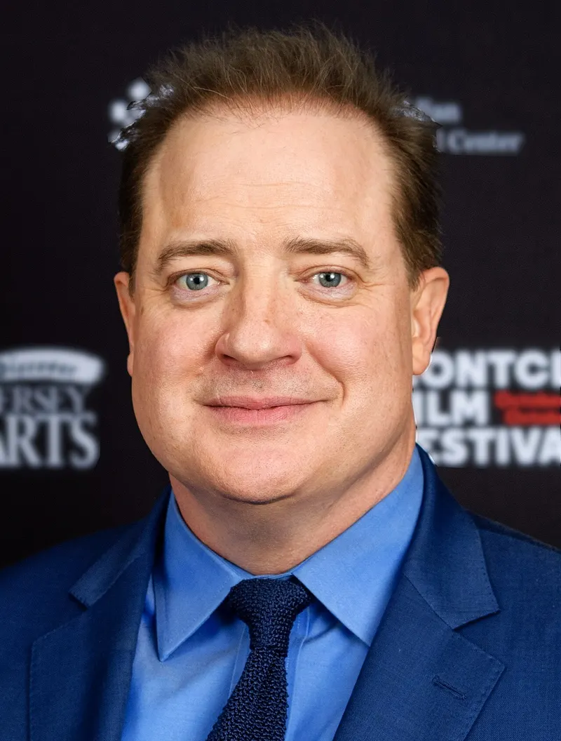 Brendan Fraser in a blue suit at a film festival