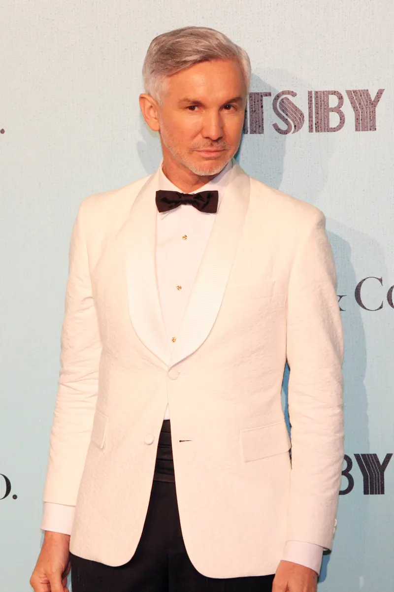 Baz Luhrmann in a white dinner jacket at a premiere