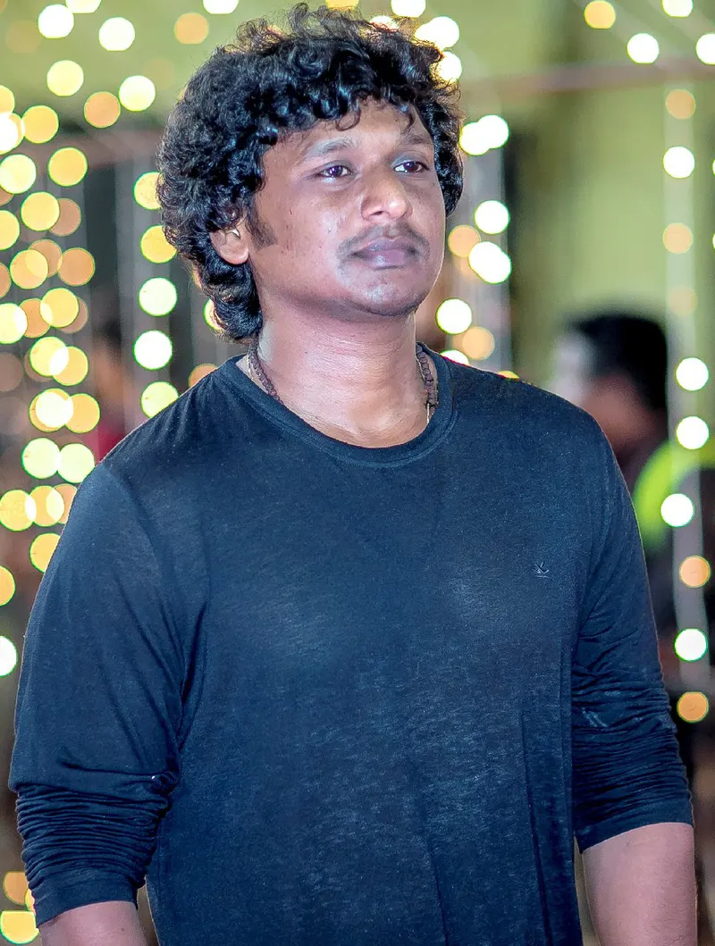 Director Lokesh Kanagaraj in a dark t-shirt at an evening event