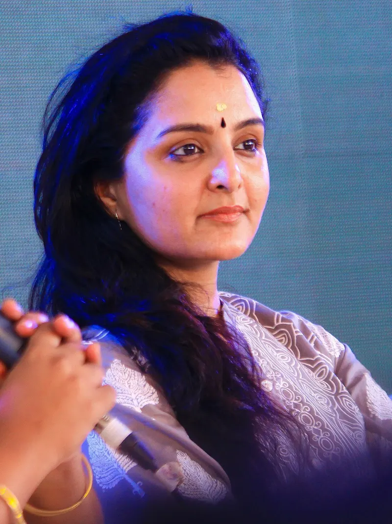 Manju Warrier seated on stage at a literature festival panel