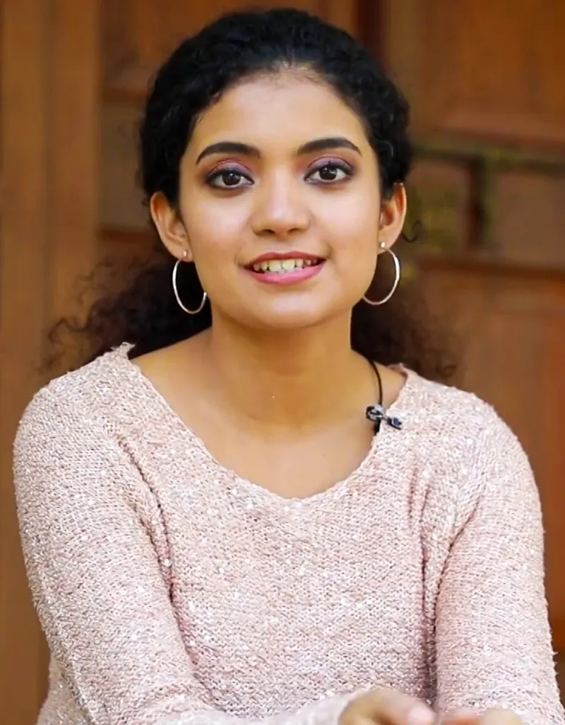 Anna Ben smiling during an interview