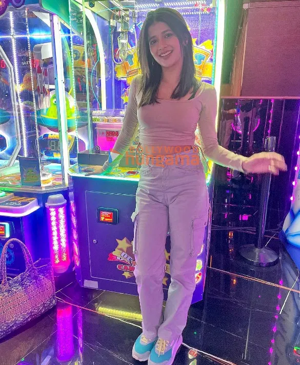 Samridhii Shukla smiling in an amusement arcade
