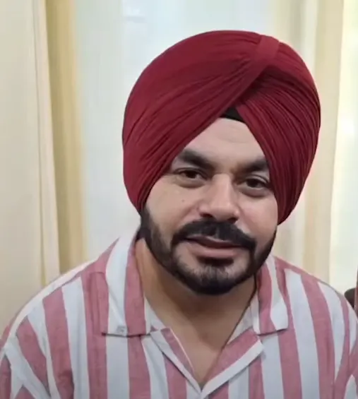 Prince Kanwaljit Singh in a maroon turban