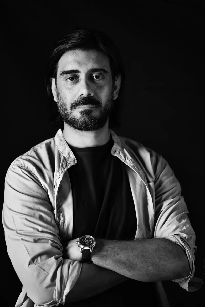 Black and white portrait of Saurabh Sachdeva with arms crossed