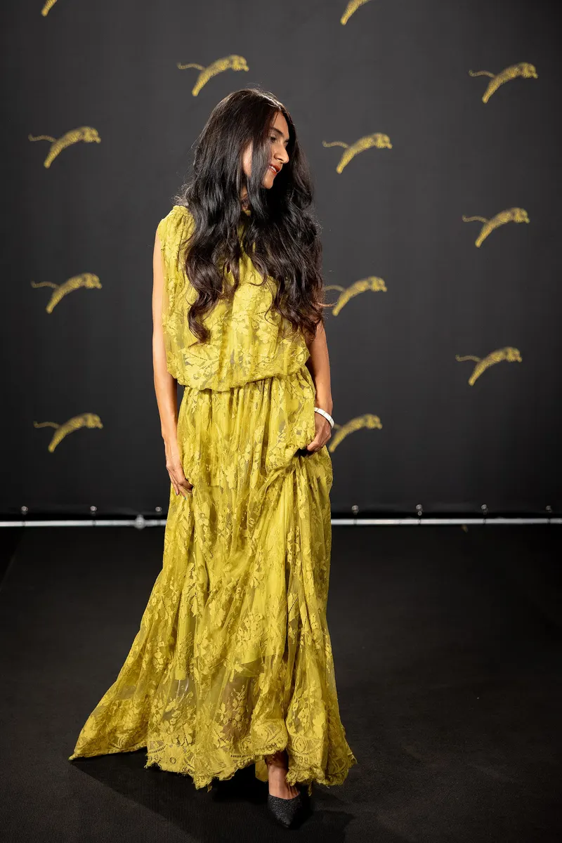 Navjot Randhawa in a long yellow lace dress at Locarno