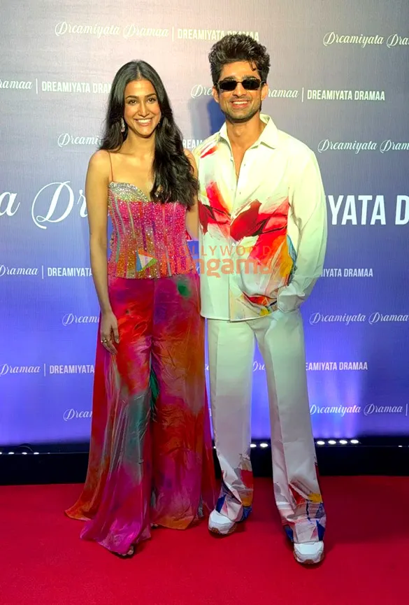 Amandeep Sidhu in a colourful outfit beside Abhishek Kumar