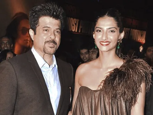 Anil Kapoor and daughter Sonam Kapoor smiling at a screening