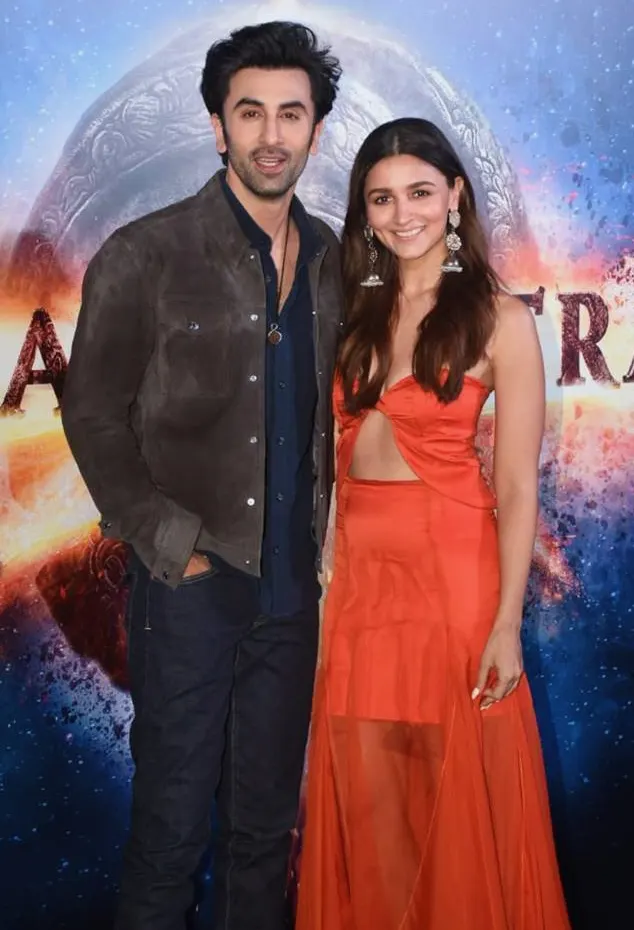 Ranbir Kapoor and Alia Bhatt standing together at a launch event