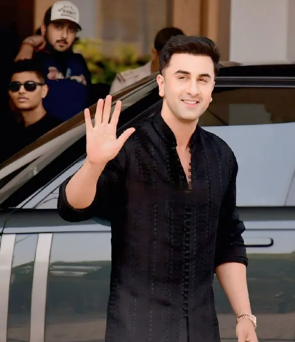Ranbir Kapoor in a black kurta waving