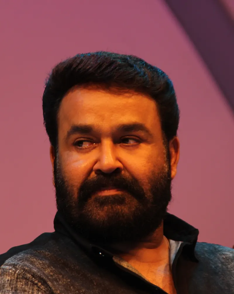 Mohanlal looking to the side at an awards ceremony