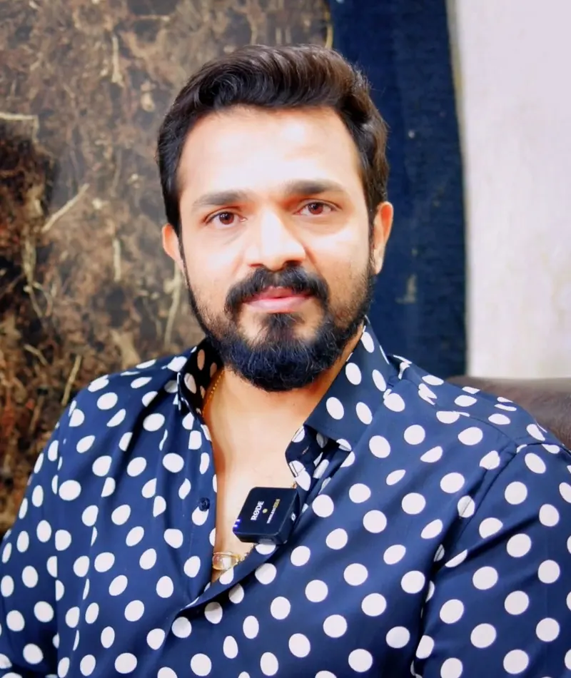 Vijay Raghavendra in a polka dot shirt